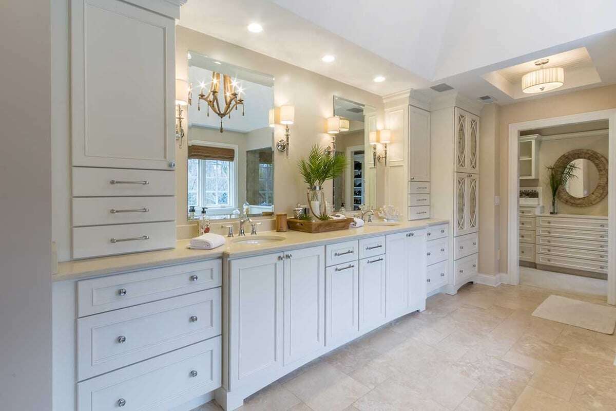 Master bathroom suite in Saddleridge with multiple cabinets and double sink vanities