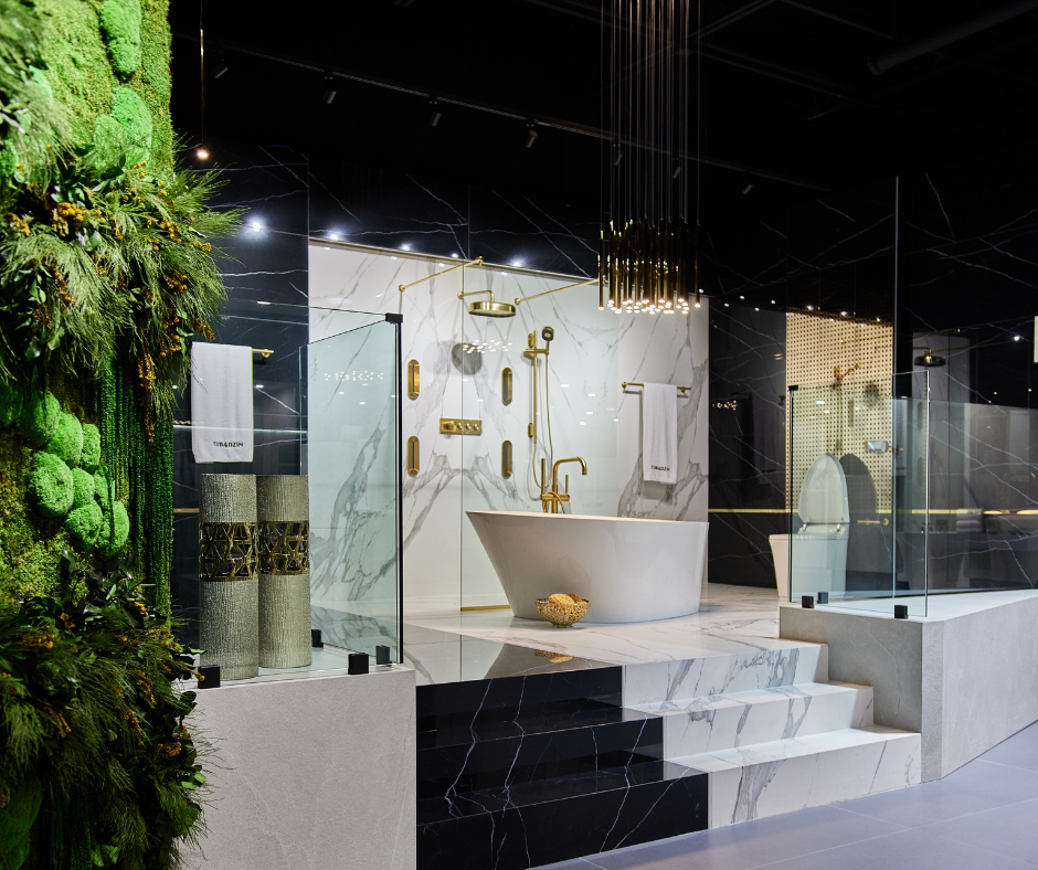 Encore Gallery luxury showroom with a biophilic design and black and white marble tile with gold fixtures