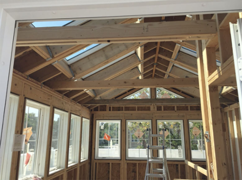 Framed-solarium-with-mullion-windows-and-skylights