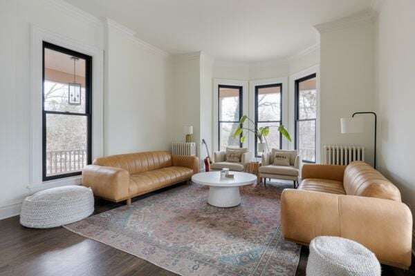 Leather sofas with a wooden coffee stool in the center - Elizabeth Reconfigured 4